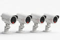 Four white security cameras with black lenses and red indicator lights in a row on white background